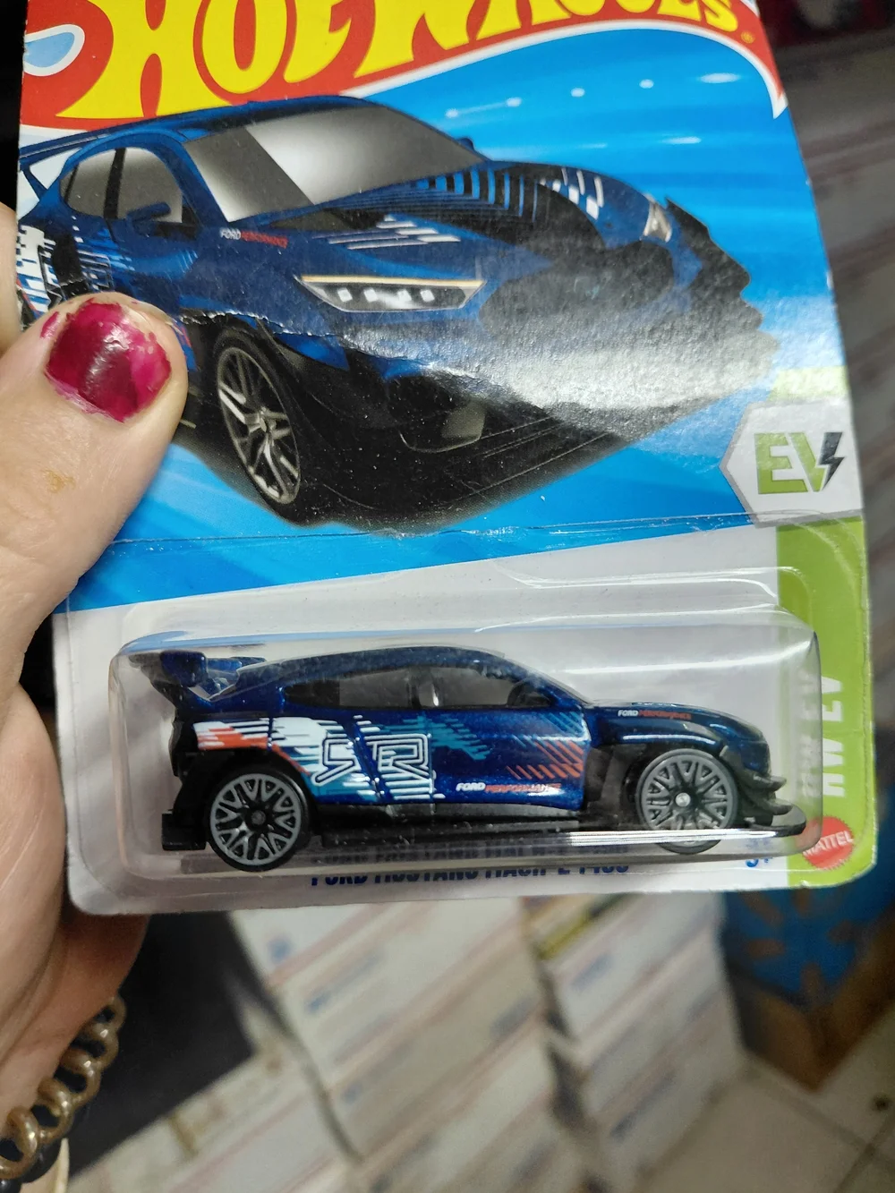dark blue Hot Wheels 1:64 scale diecast model of the Ford Mustang Mach-E 1400